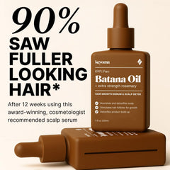 Keyoma Batana Oil applied to hair strand highlights shine and moisture.
