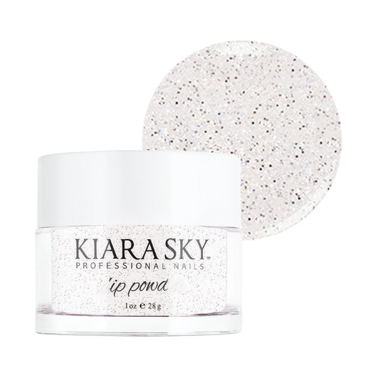 Kiara Sky Masterpiece silver dip powder on nails for a luminous finish.