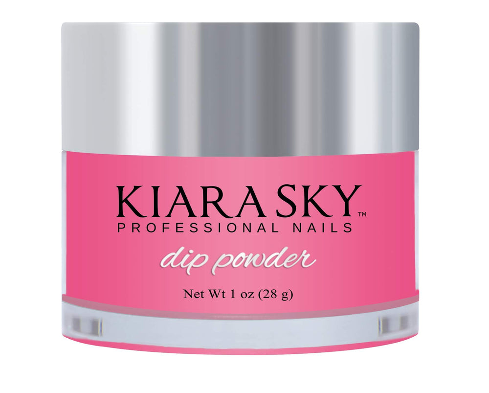 Kiara Sky Flamin-Glo dip powder bottle close-up with pink glow for radiant nails.