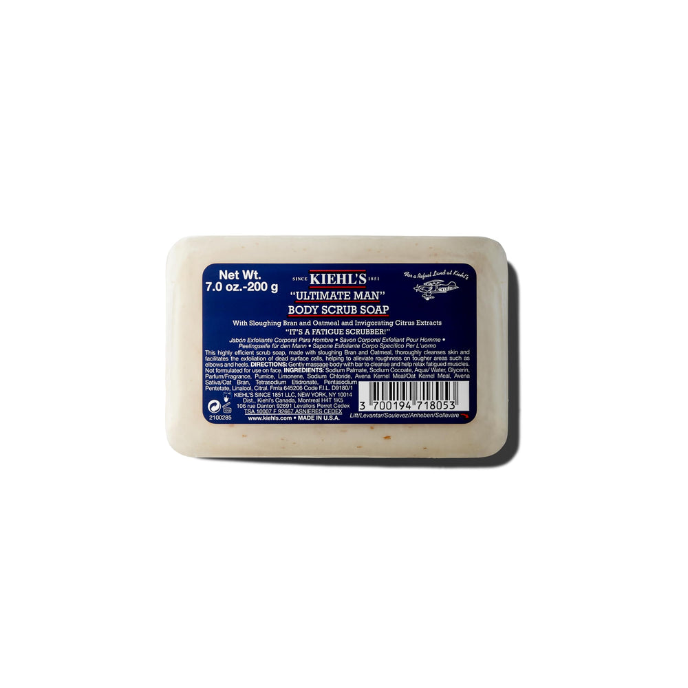 Kiehl's Ultimate Man Body Scrub close-up shows exfoliating texture with oat bran for smooth skin.
