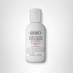 Packaging label emphasizes paraben-free formula and broad protection.