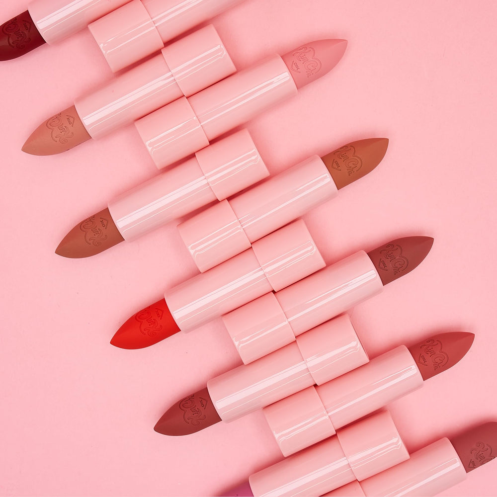 Kimchi Chic Marshmallow Butter Lippie Cafe Au Lait shade swatch for warm nude lips.