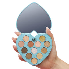 Kimchi Chic Spinning Hearts Love Eyeshadow palette stays put for hours of wear.