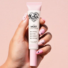 KimChiChic The Most Concealer built-in brush demonstrates precise blending.
