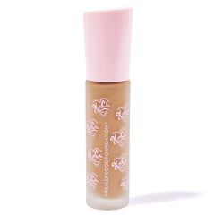 KimChiChic foundation on face demonstrates medium to full coverage and glow.