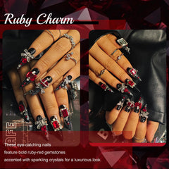KimKista stiletto nails with red rhinestones for luxe glam.