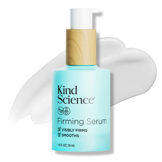 Kind Science Firming Serum bottle close-up showing fragrance-free formula for sensitive skin.