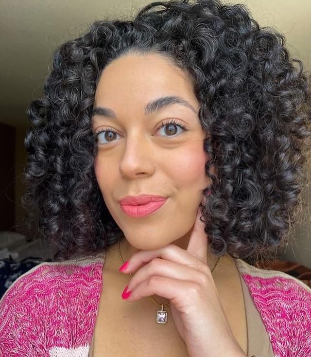 Kinky Curly Come Clean Shampoo foam demonstrates gentle cleansing for daily use.