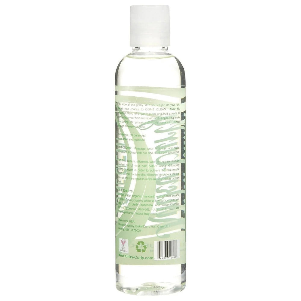Kinky Curly Come Clean Shampoo label closeup featuring chelating properties for buildup removal.