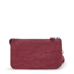 Kipling Creativity Large Pouch as compact travel kit for organizing essentials