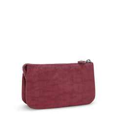 Kipling Creativity Large Pouch held in hand for portable on-the-go storage