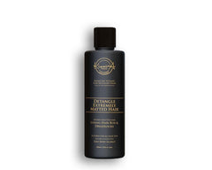 KizaiaCare Ultimate Matted Hair Detangler bottle pour showing easy dispensing for painless detangling