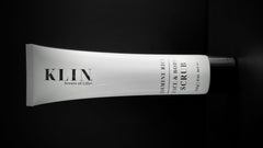 KLIN Jasmine Rice Scrub in use image showing circular massage on skin.