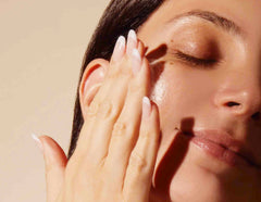 Knours face application tap motions showing upward, gentle patting for absorption.