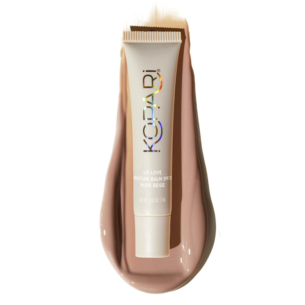 Kopari Lip Love Moisture Balm nude beige tube close-up for silky hydration