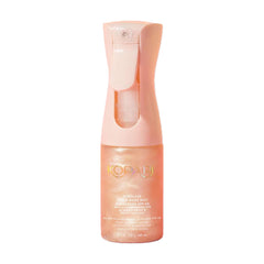 Kopari Rose Gold Sunglaze sunscreen bottle provides lightweight SPF 42 protection with a luminous finish