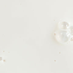 KORA Organics Silky Sun Drops spread on skin for a dewy finish.