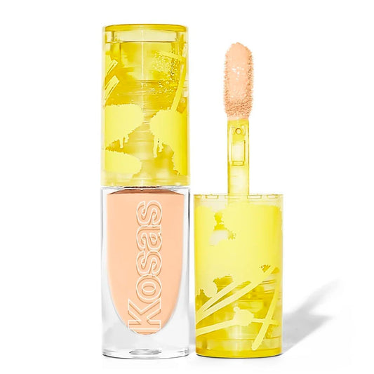 Kosas Mini Revealer Concealer tube close-up for portable brightening touch-ups.