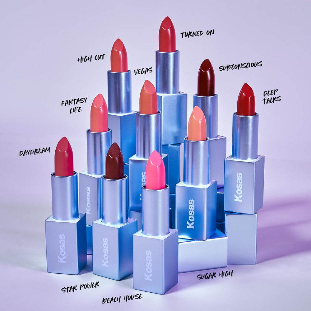 Lips wearing Kosas Lip Color with glossy satin shine.