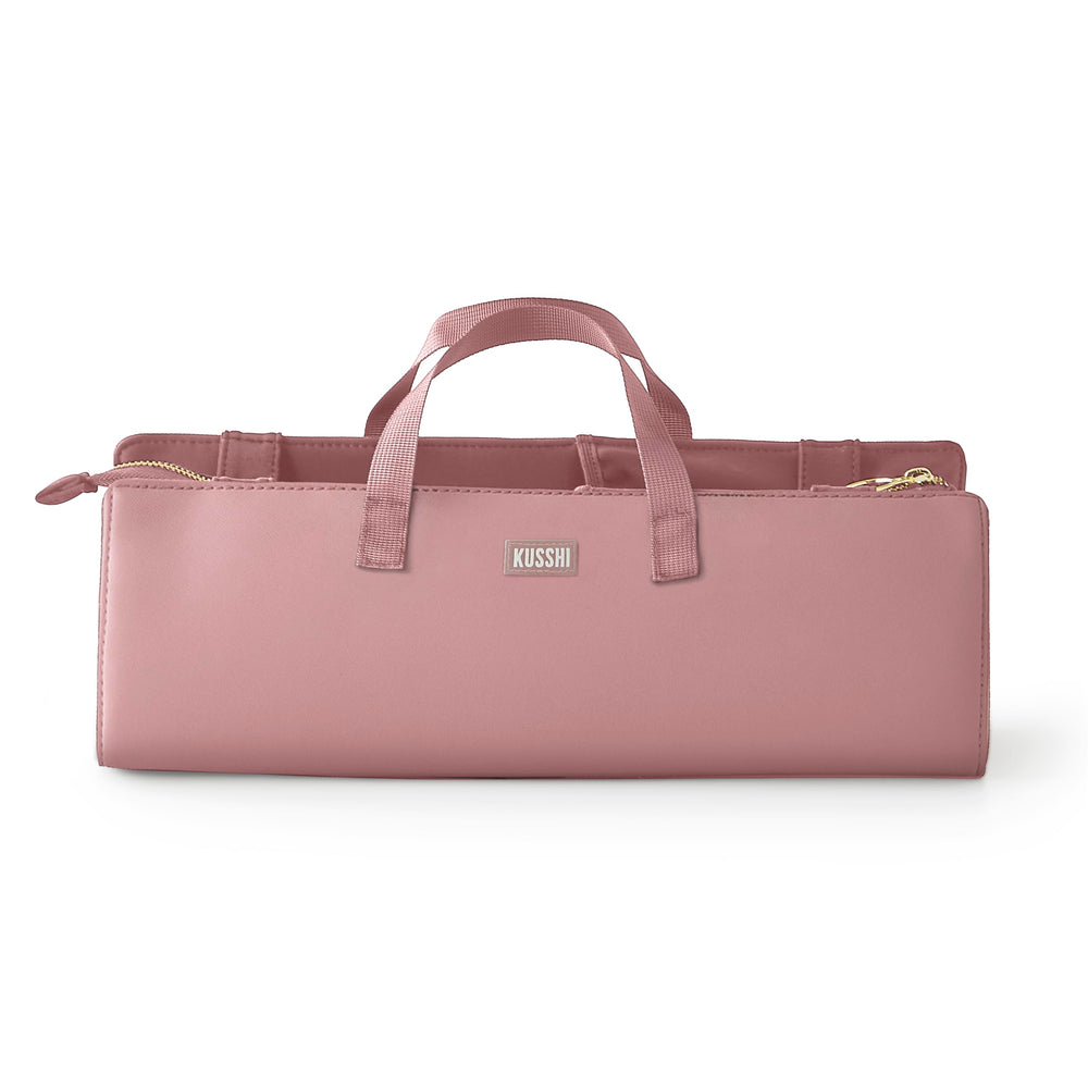 KUSSHI bag with elastic pockets keeps brushes secure on the go