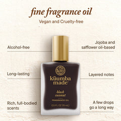 Kuumba Made Black Coconut fragrance oil drops on wrist demonstrate easy daily use.