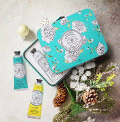 La Chatelaine Citrus Fizz hand cream jar delivers quick-absorbing moisture.