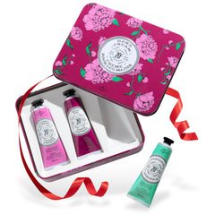 La Chatelaine hand cream gift set front view with three travel tins.