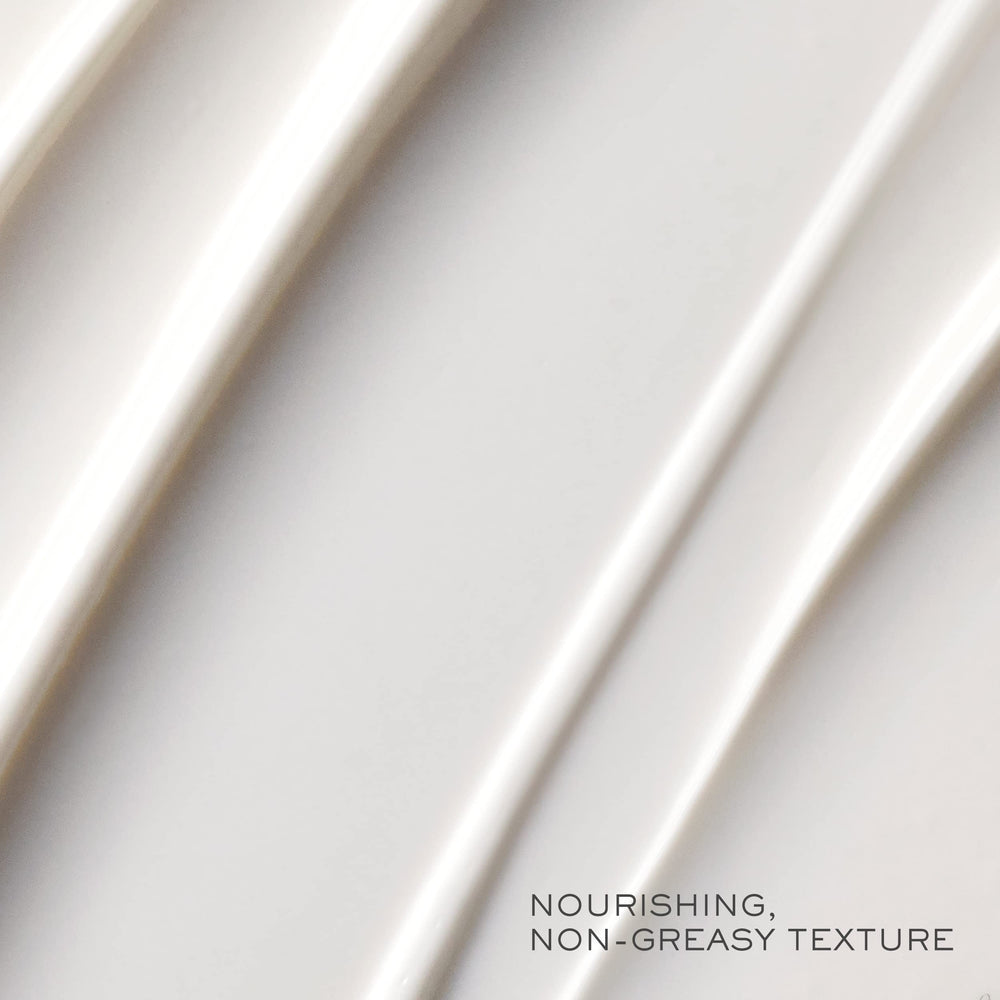 Close-up of Lancôme Absolue BX cream texture for smooth application.