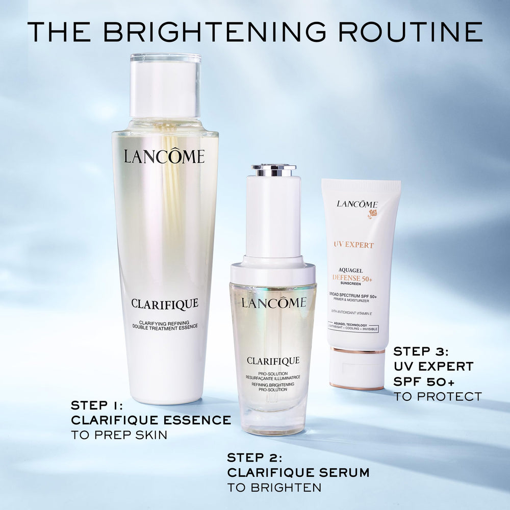 Lancome Clarifique bottle being shaken to blend the two phases.