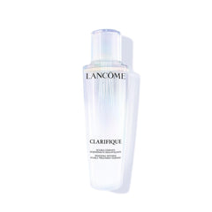 Lancome Clarifique essence bottle close-up showing two-phase blend for brighter skin.