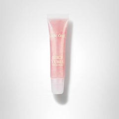 Lancôme Juicy Tubes compact in hand highlights premium packaging.