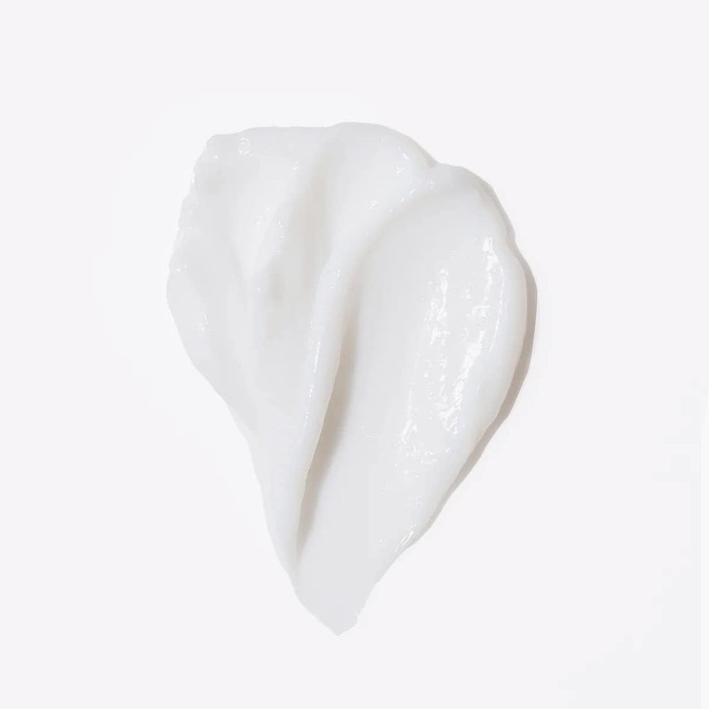 L'ANGE HAIR Curl Care in use on damp hair for detangling.