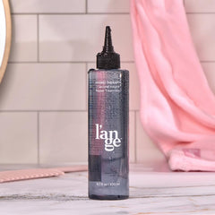 L'ANGE HAIR Hydro Therapy packaging close-up highlights lightweight, non-greasy feel