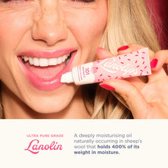 Compact Lanolips 101 ointment in hand demonstrates easy on-the-go application.