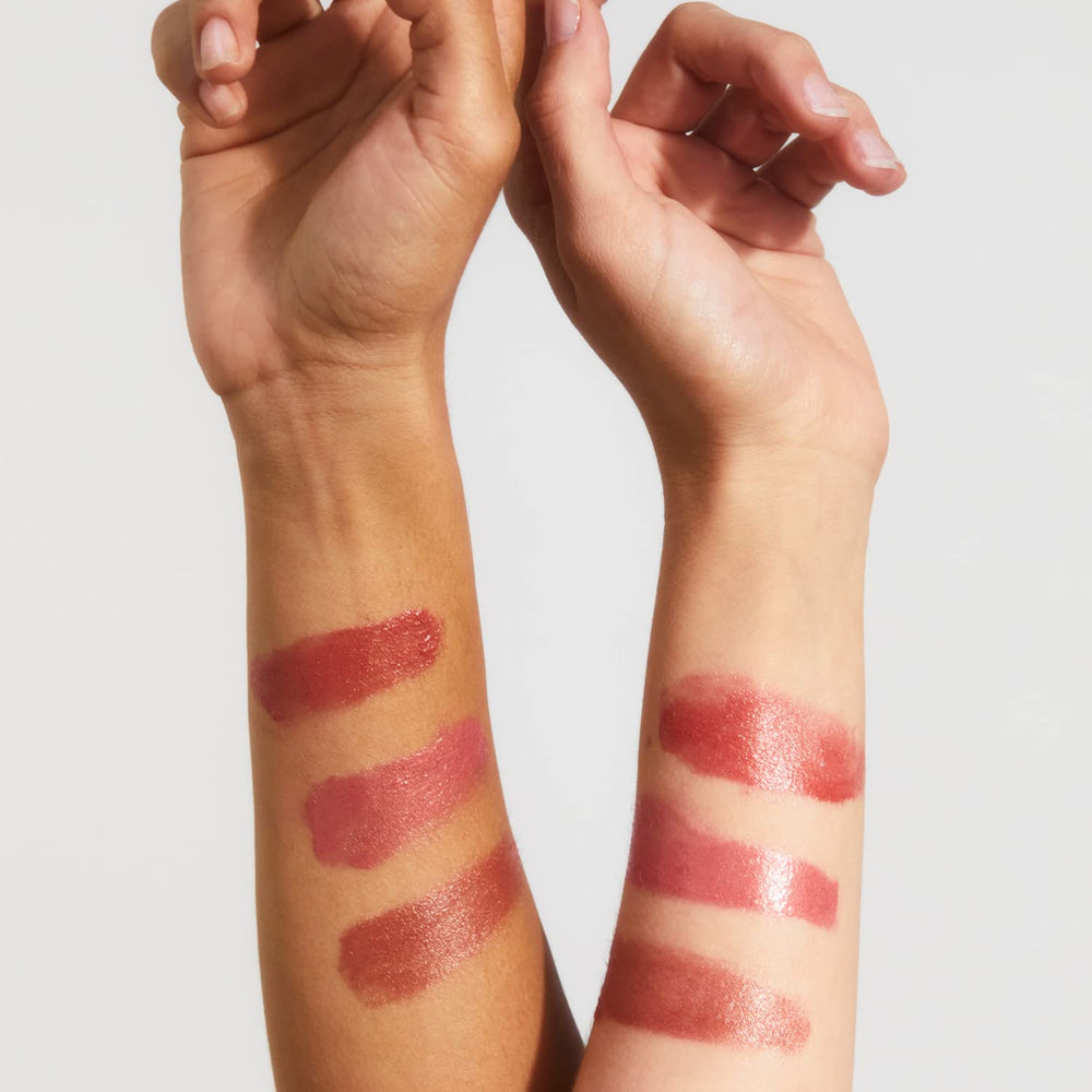 Lanolips Baby Rose Gold 101 balm texture closeup shows rose gold pigments.