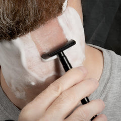 Lather & Wood shaving setup with brush and razor for a traditional shave.