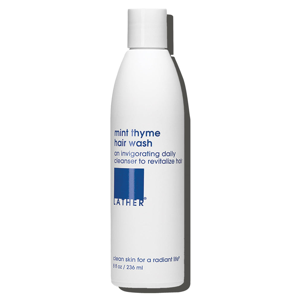 LATHER Mint Thyme Hair Wash bottle offers a refreshing daily cleanse for sensitive skin.