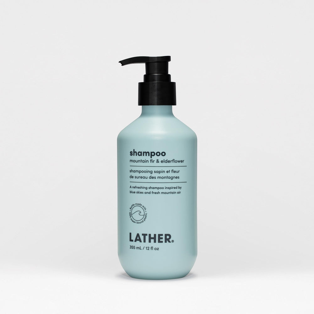 LATHER Mountain Fir and Elderflower shampoo bottle for all hair types, gentle cleansing.