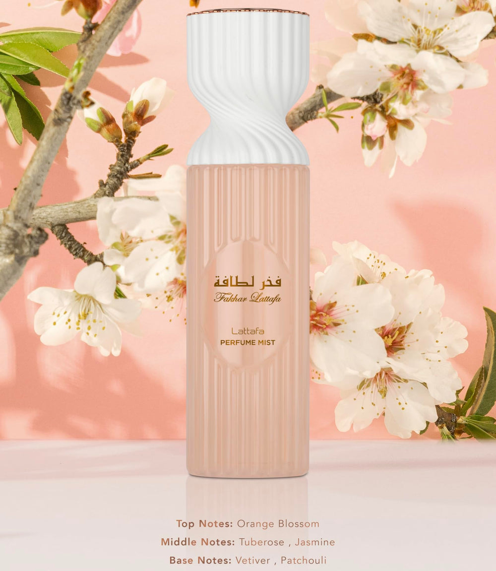Lattafa Fakhar Perfume Mist spray close-up, emphasizing a light, refreshing floral aroma