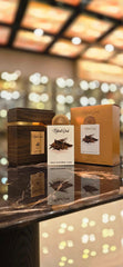 Lattafa Pride Natural Oud gift box signals luxurious unisex fragrance for special occasions.