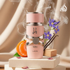 Lattafa Yara elegant bottle sits on a vanity for a refined gift.