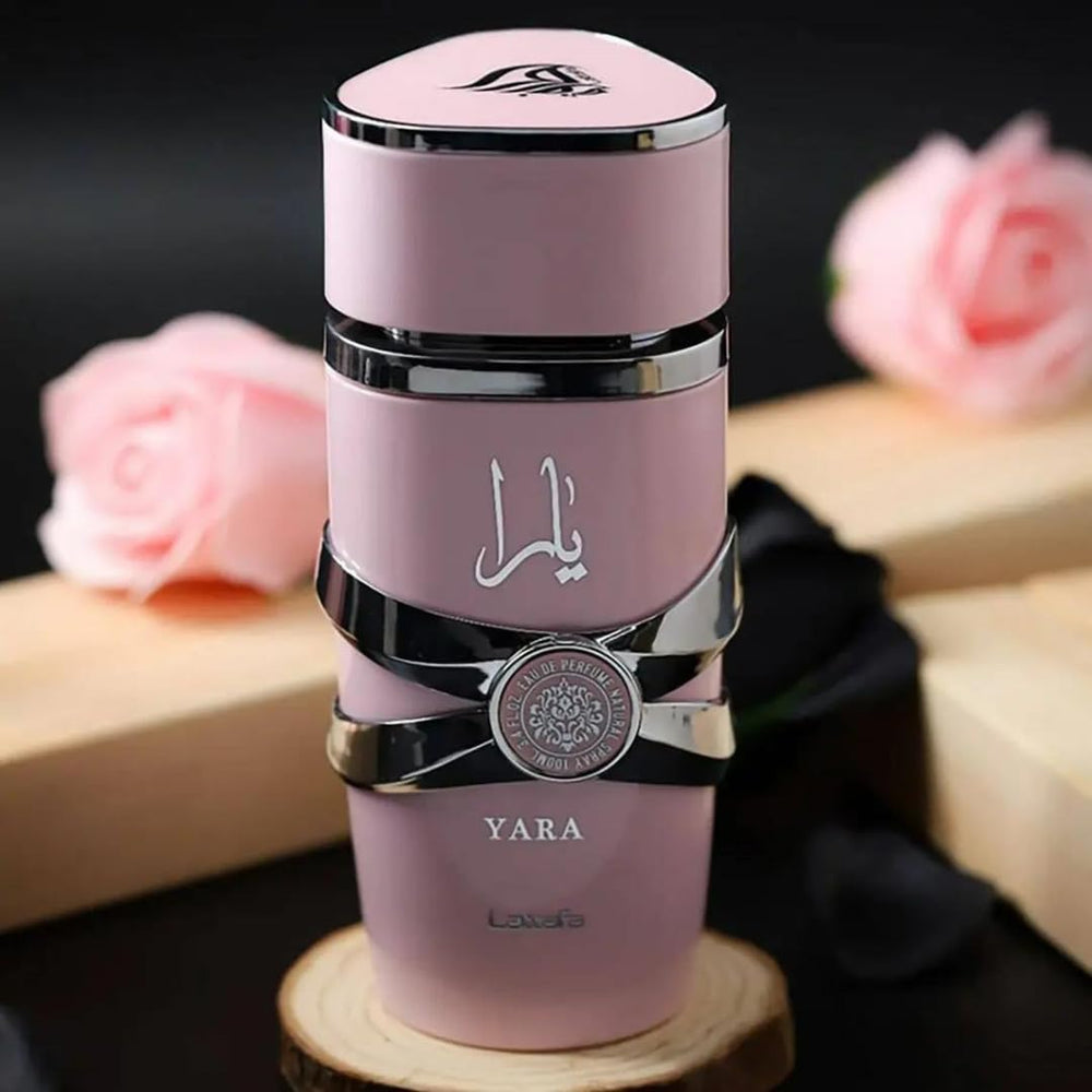 Lattafa Yara bottle on wrist, suggesting subtle, long-lasting aura.