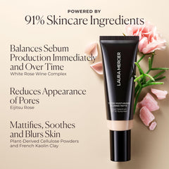 Close-up of Laura Mercier skin tint showing blurring and smooth texture.