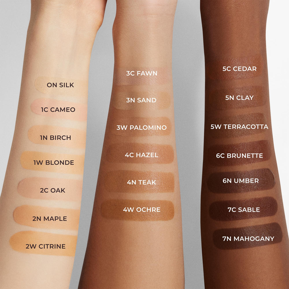Close-up swirl of Laura Mercier tinted moisturizer showing sheer to light coverage.