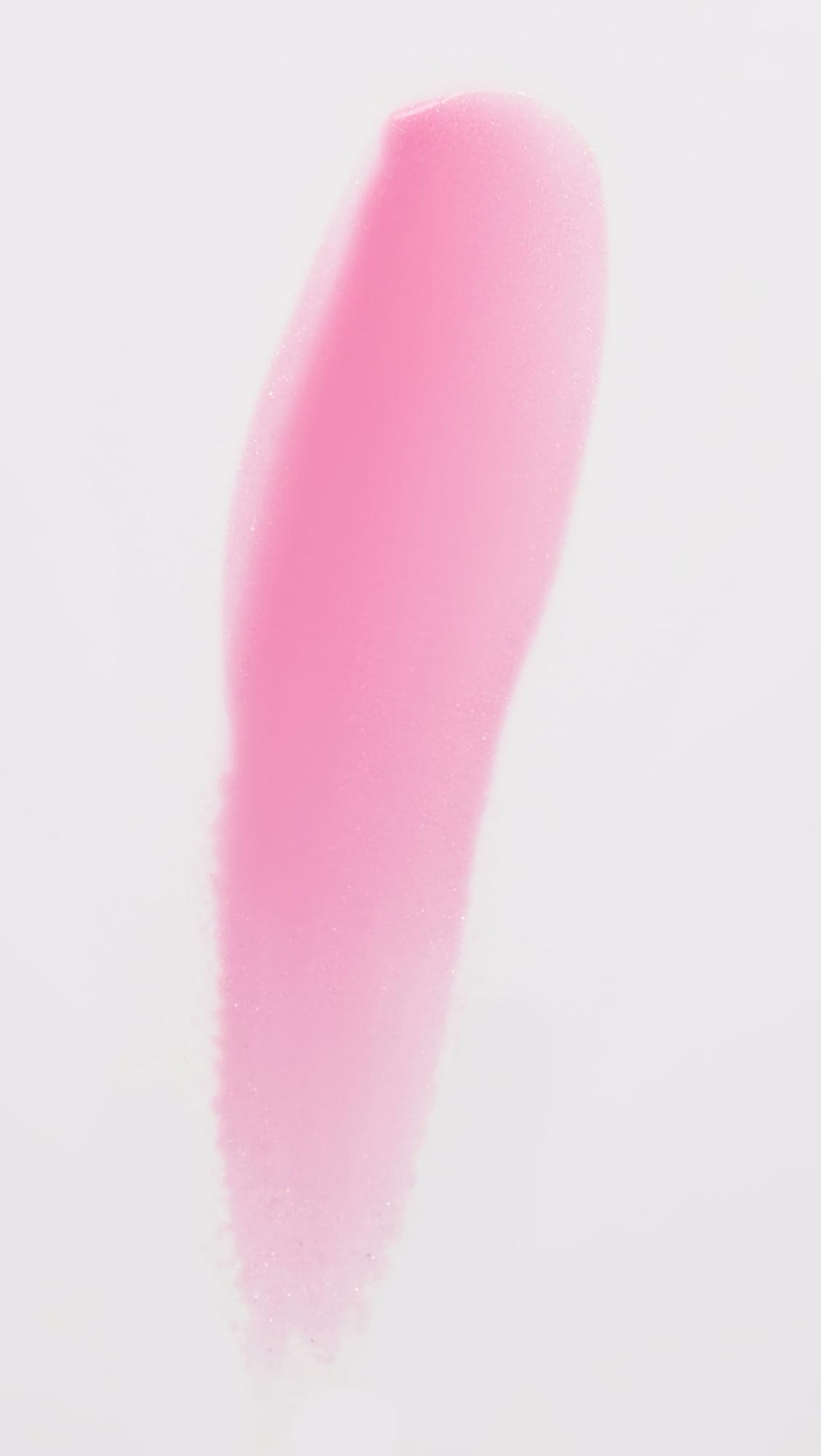 Close-up of Lawless Daisy Pink gloss on lips showing sheer, shiny plump effect