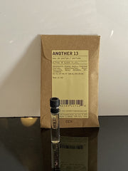 Le Labo Another 13 dabber packaging, compact and travel-ready.