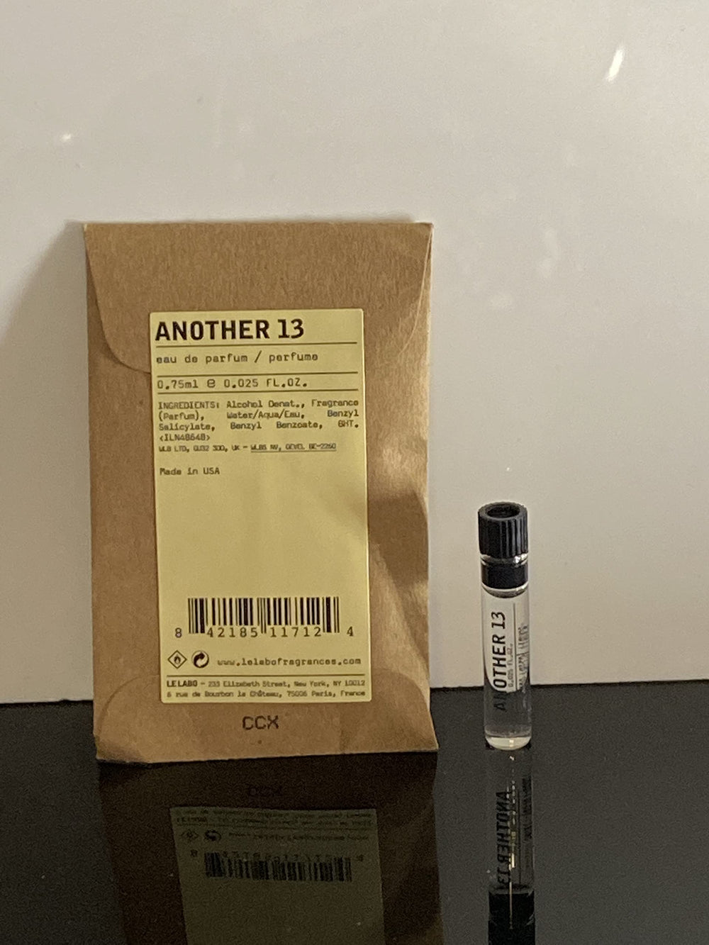 Le Labo Another 13 dabber sample bottle, compact and portable for testing.