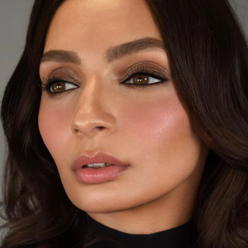 Swatch on skin showing sheer, buildable color and hydration