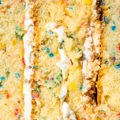 Le Monde Gourmand Confetti Dore close-up swirl hints at luxury sweetness.