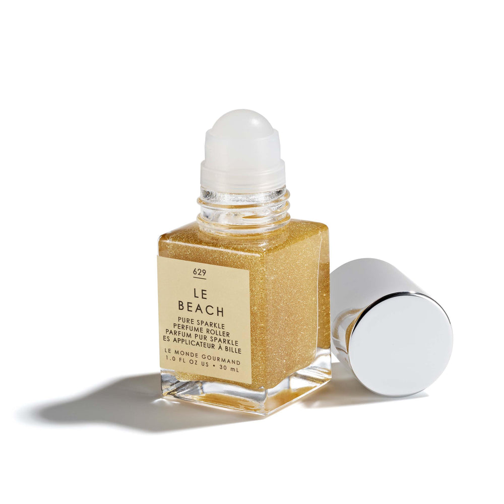 Le Monde Gourmand Le Beach Perfume Oil packaging display highlighting chic travel-ready bottle